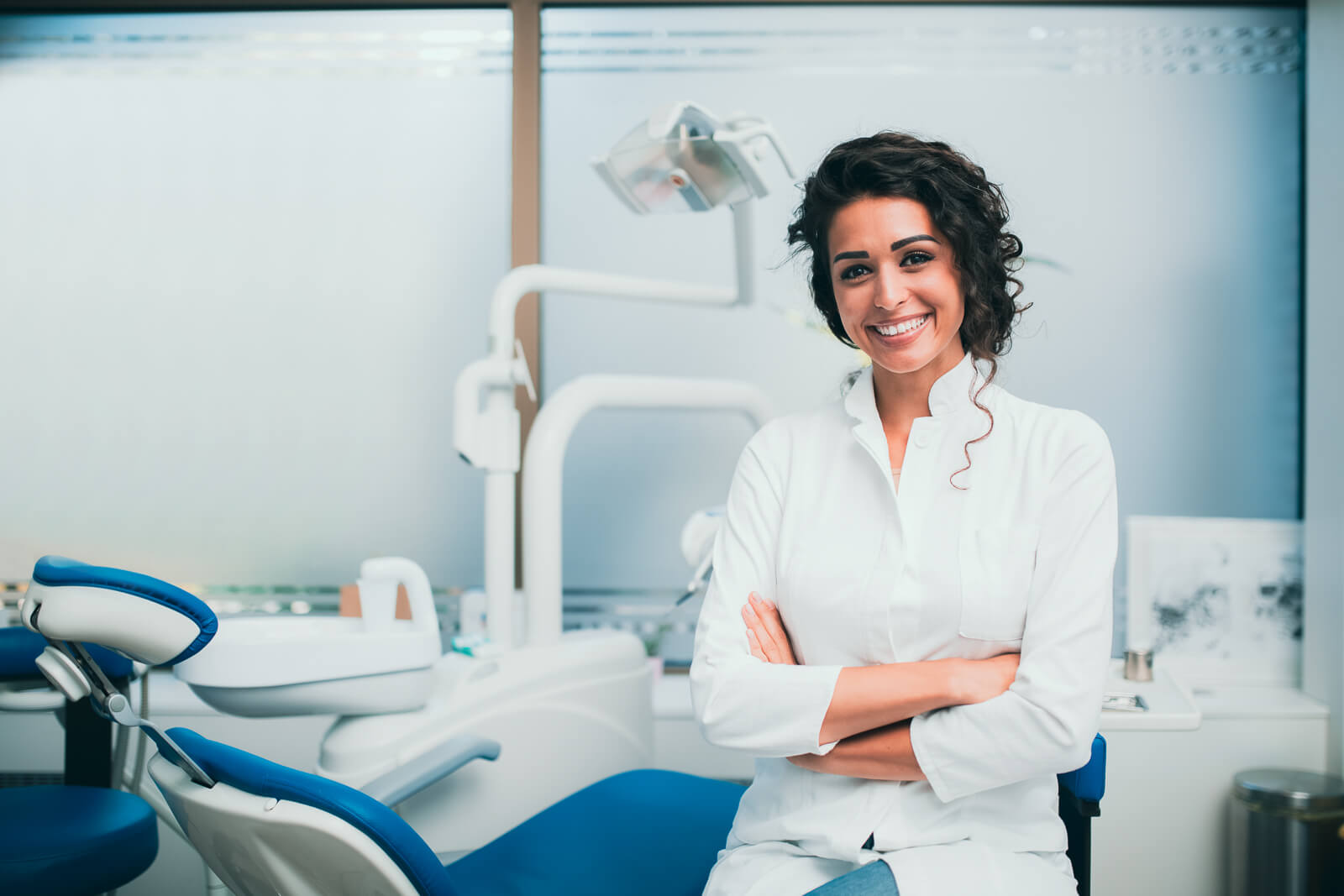 A dentist smiling.