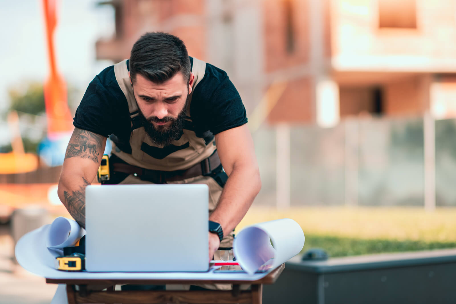 A Home Services worker using a computer.